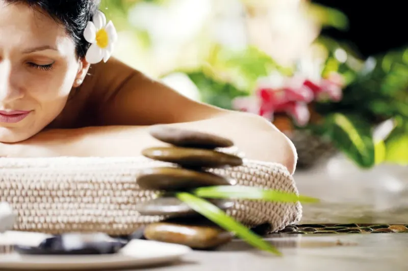 A guest resting before a hot stone massage