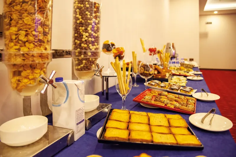 Coffee-break table: biscuits, rusks and breakfast cereals
